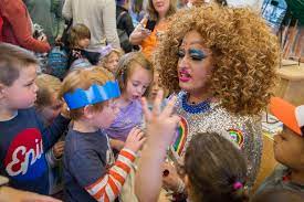 A man leading Drag Queen Story Hour