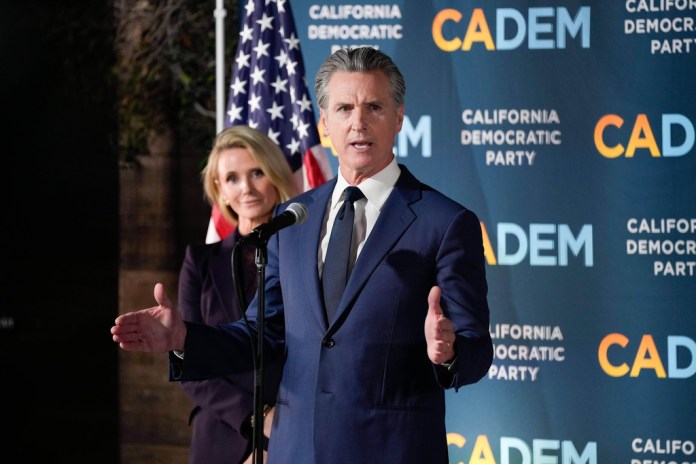 Newsom continues to
spend California into a budget hole